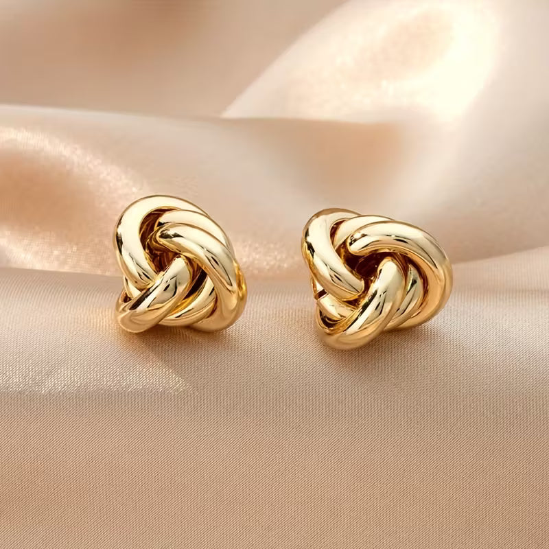 Goldene Ohrstecker "gldFARIDA" in Knotenoptik